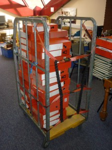 Royal Mail cart (or trolley) laden with pamphlet boxes