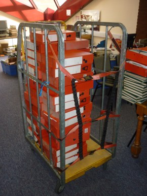 Royal Mail cart (or trolley) laden with pamphlet boxes