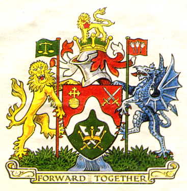 The shield and emblem of Brent Council. A lion and a dragon flank a shield. At the bottom the River Brent is depicted and beneath it says the Brent motto, "Forward Together"